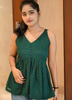 Image of Emerald Green Textured Sleeveless Peplum Top