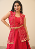 Image of Stylish Red Raw Silk Lehenga with Embroidered Net Shrug and Unstitched Choli